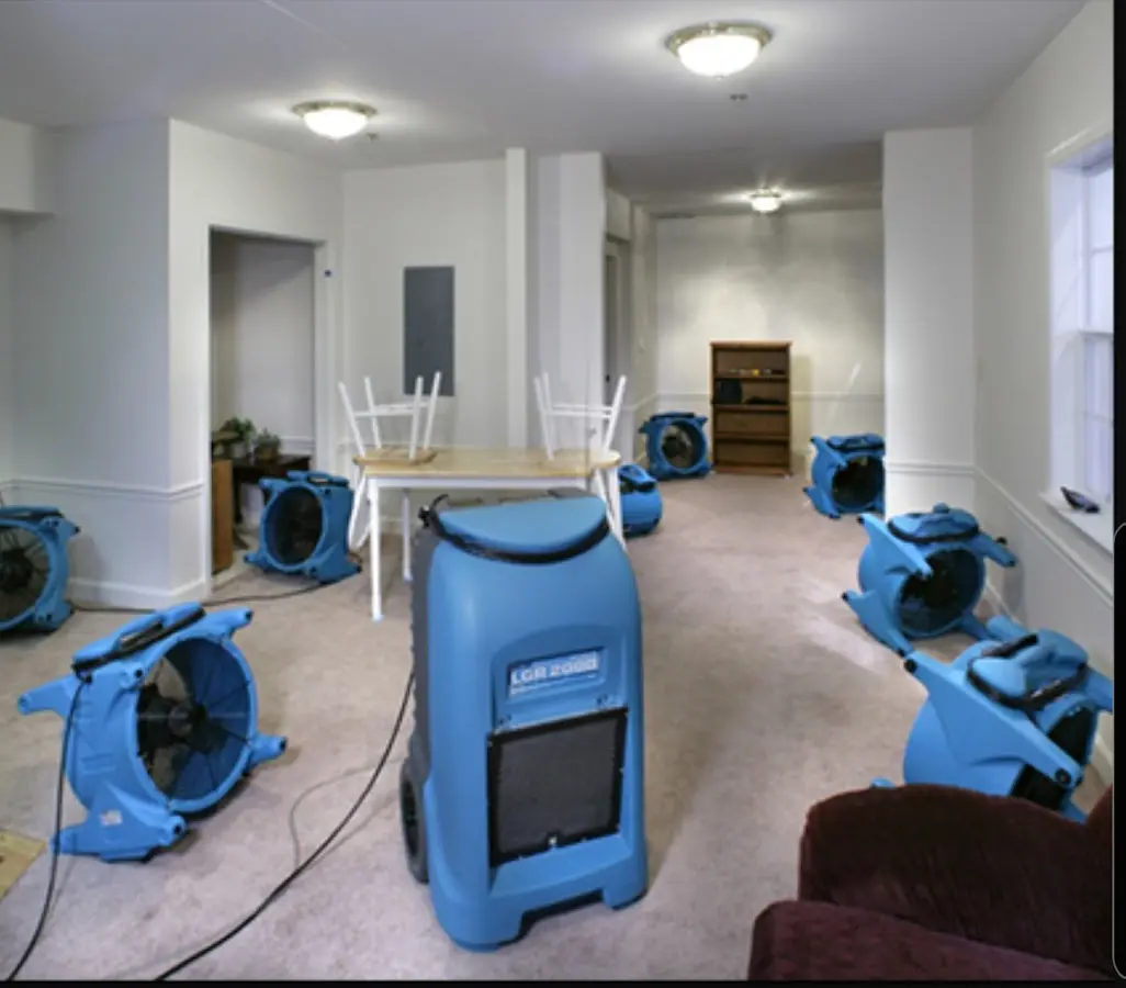 Air movers and dehumidifier setup for Water Damage Restoration in Suncrest